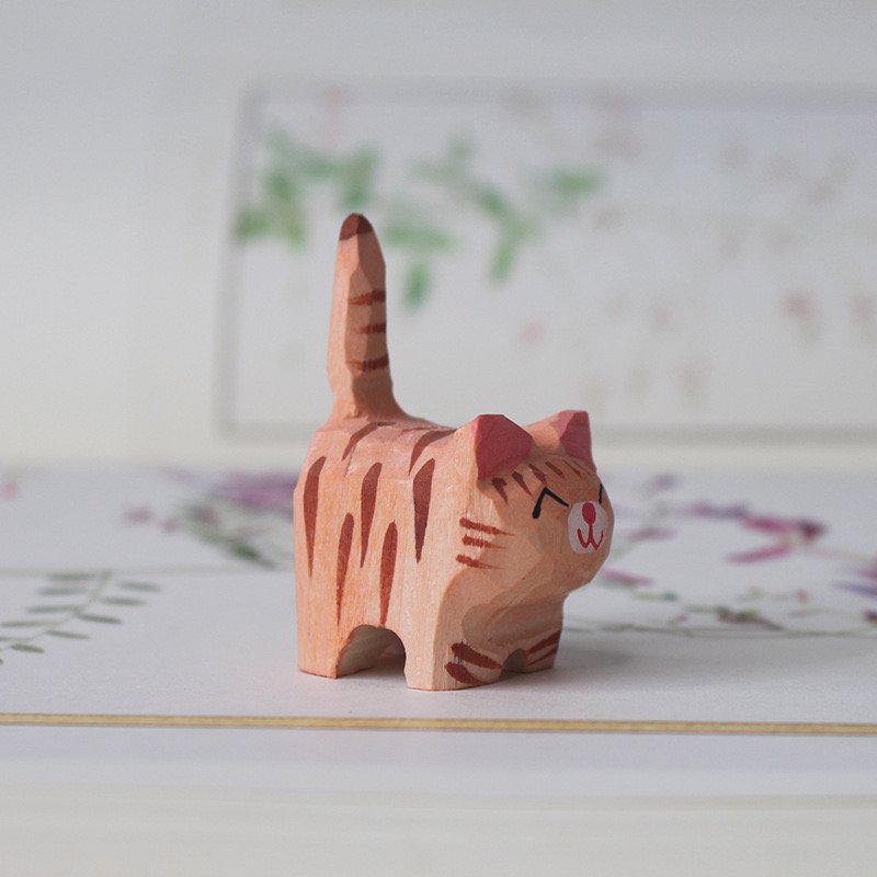 wooden orange cat scuplture